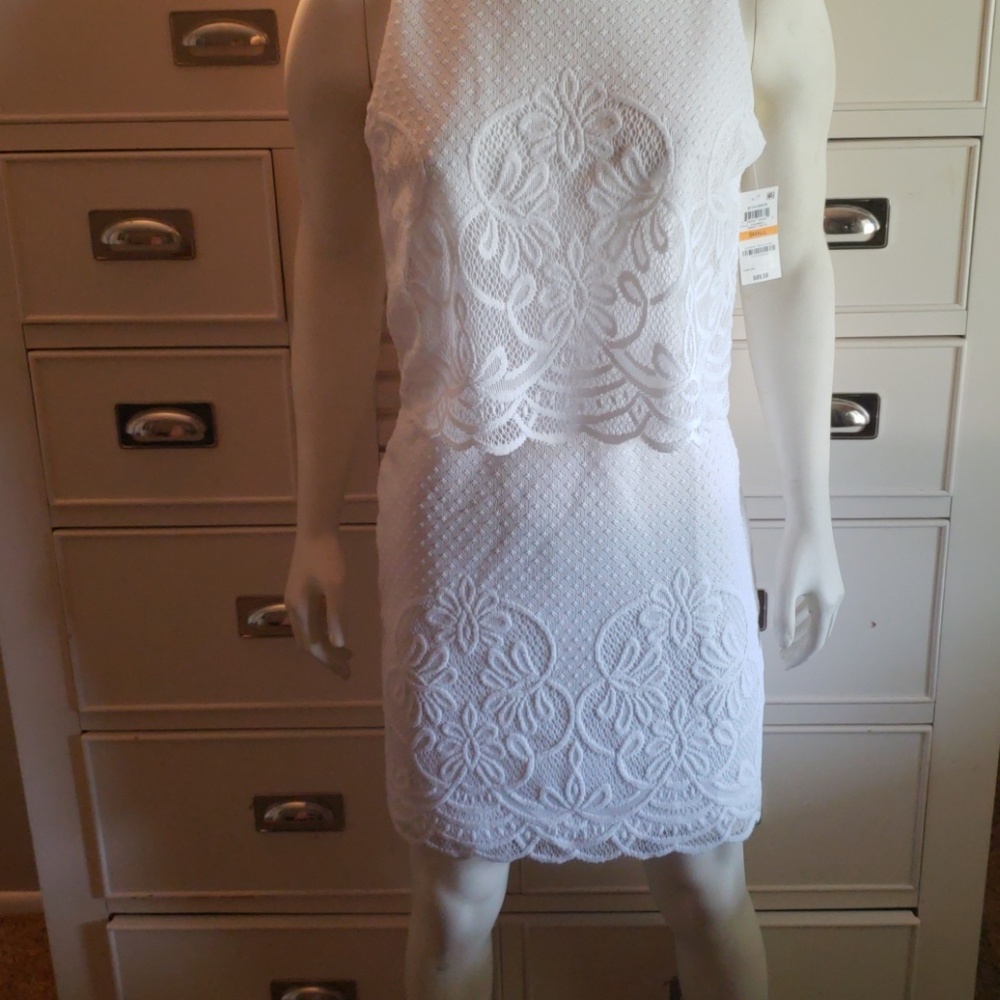 White sleeveless dress by Charter club.